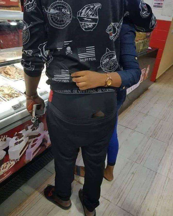 Holds Car key and iPhone but spotted wearing tore underwear