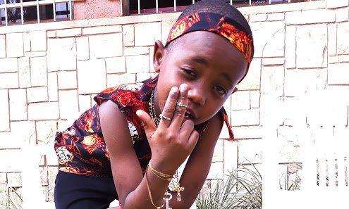 "Stay in school" - Minister tells youngest rapper, Fresh Kid