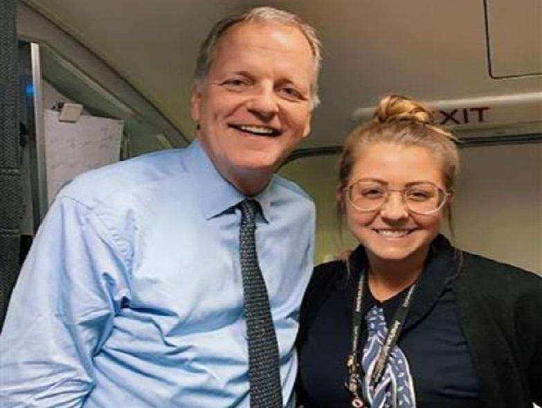 Oops! Stewardess drops tray full of drinks in a cross from CEO