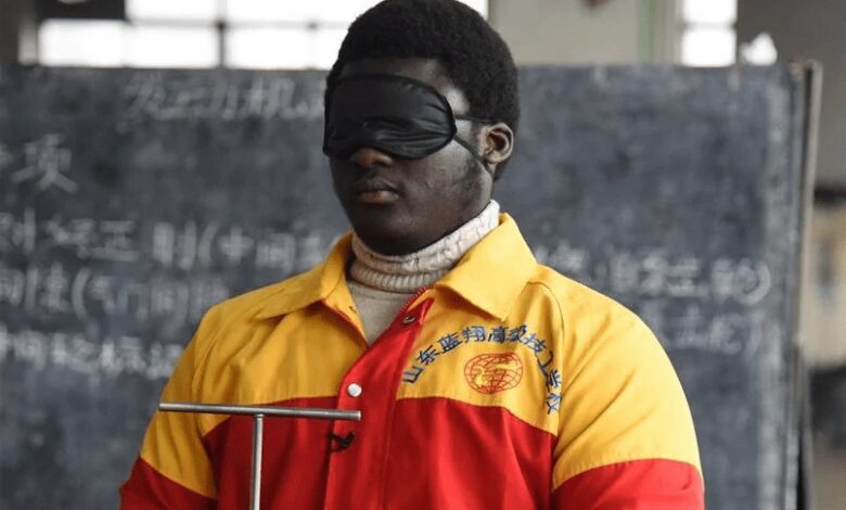 Thompson, the Ghanaian who works blindfolded in China