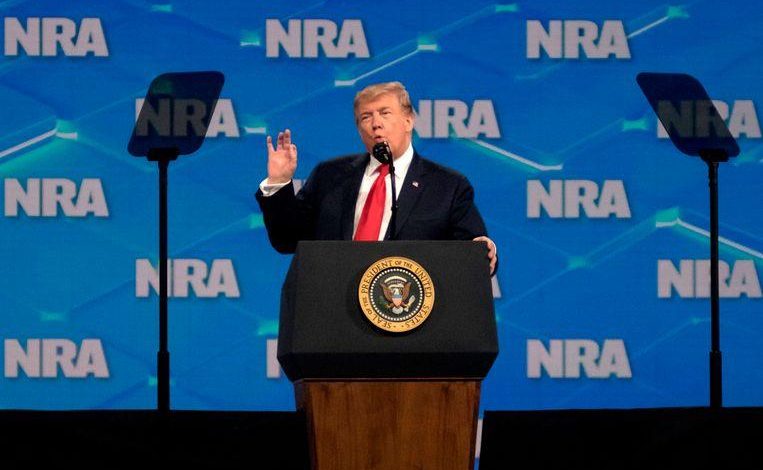 Cell phone thrower misses Trump at NRA meeting