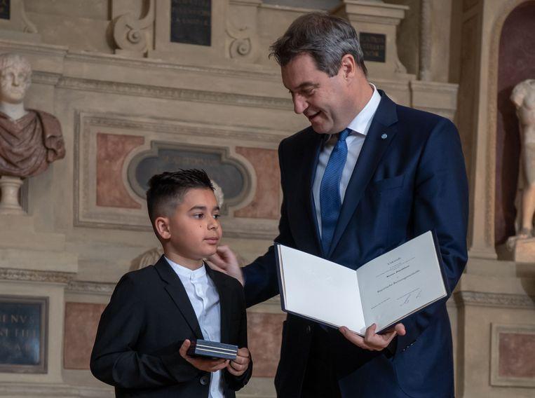 Medal for 10-year-old German boy rescuing his sister from burning car