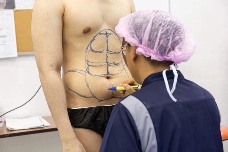 Don't feel like exercising? Thai clinic introduces instant six-pack