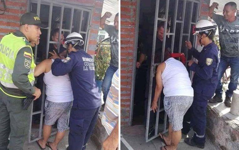 Woman stuck with her head after she wants to peek at the neighbors