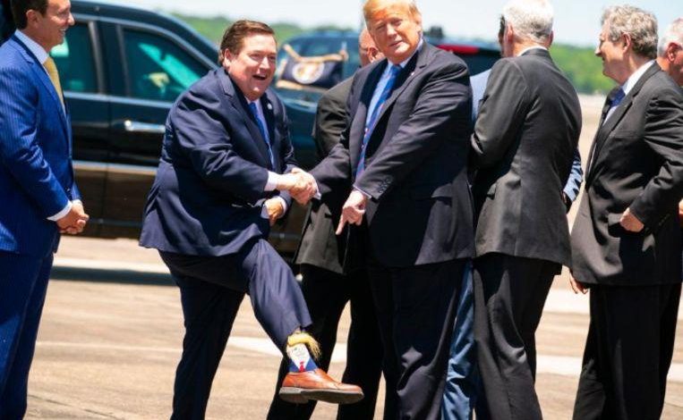 Billy Nungesser greets US President with bizarre (hairy) Trump socks