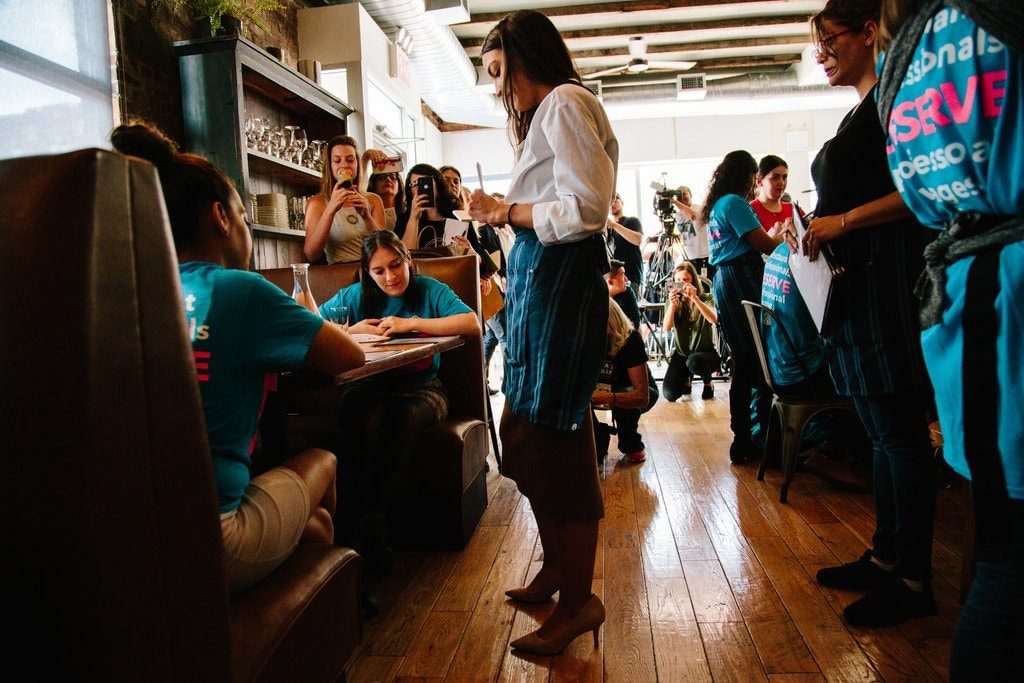 Alexandria Ocasio-Cortez serves cocktails for $2.13 an hour