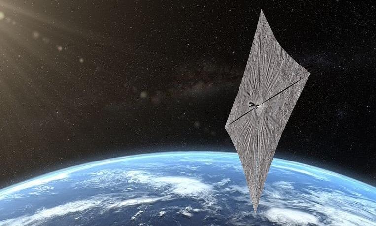 Lightsail 2 in space: spacecraft orbiting the Earth in sunlight