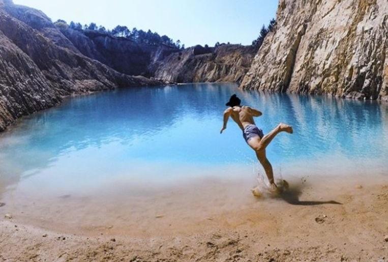 Instagrammers seriously ill after posing at toxic turquoise lake in Spain