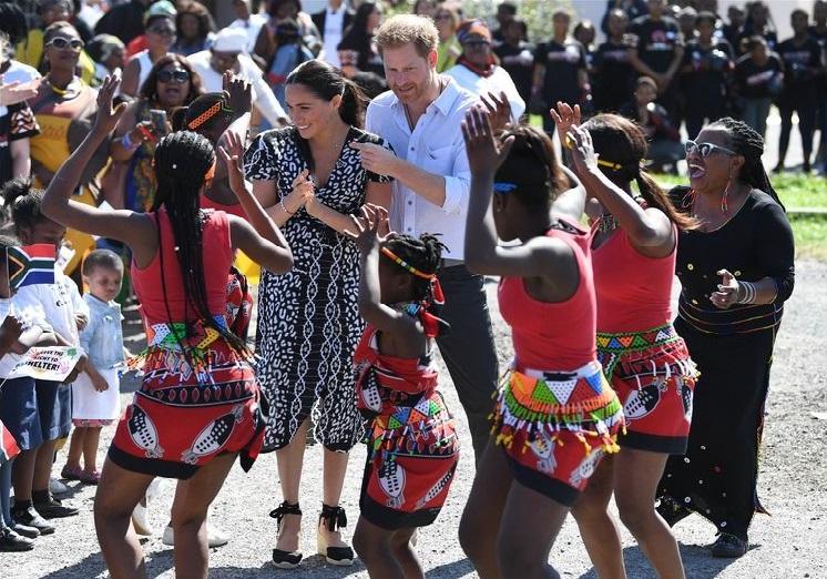 Harry and Meghan tease a dance in Cape Town