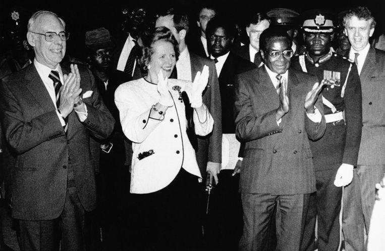 In 1981 with then British Prime Minister Margaret Thatcher and her husband Dennis.