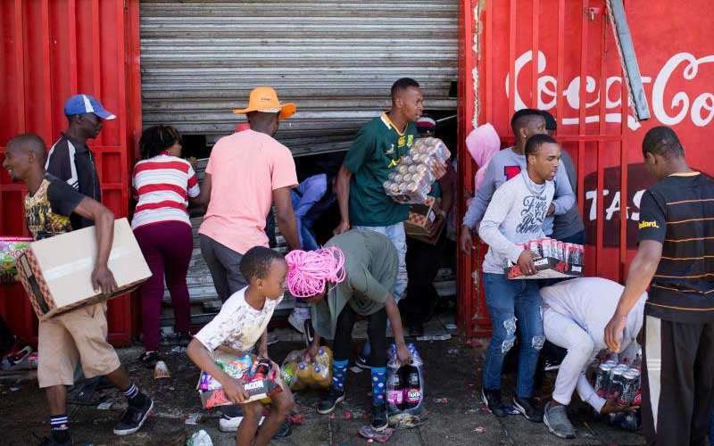 Children are seen in the looting of the shop