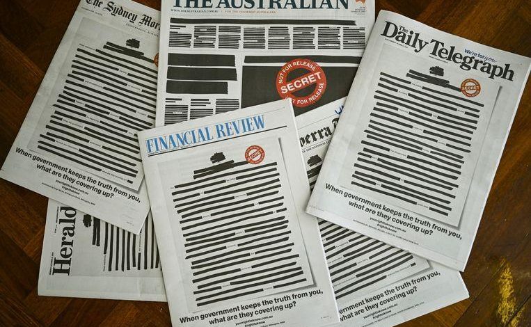 Front pages of Australian newspapers are blacked out in protest