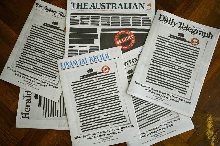 Front pages of Australian newspapers are blacked out in protest