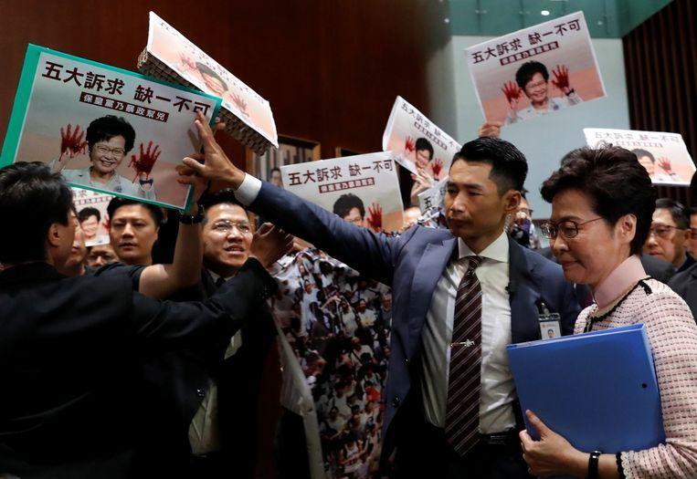 Chaos in Hong Kong parliament: government leader must abort speech after MPs protest
