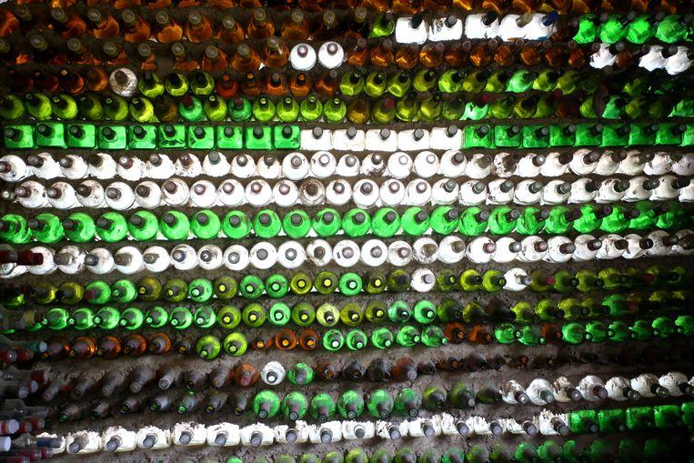 Unseen recycling: home of 6,000 discarded bottles 