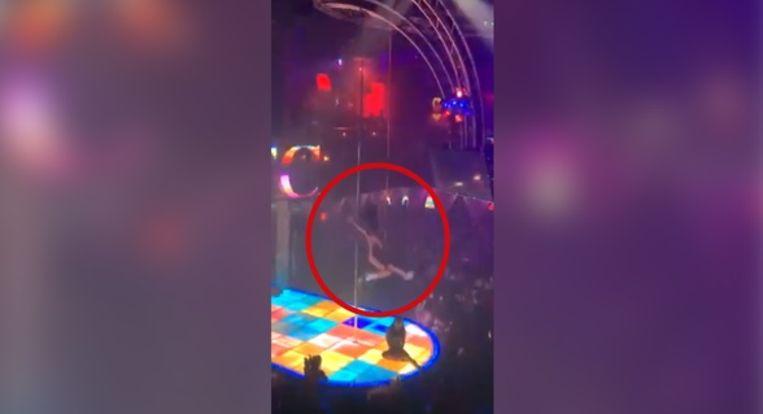Pole dancer thunders 6 meters down and continues stripping