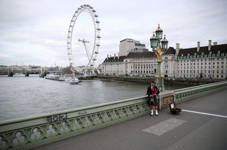 This bagpipe player is brave at an empty Westminster Bridge in London.