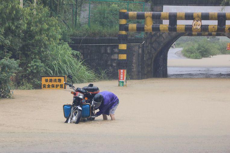 Floods kill tens and displace many residents in China 