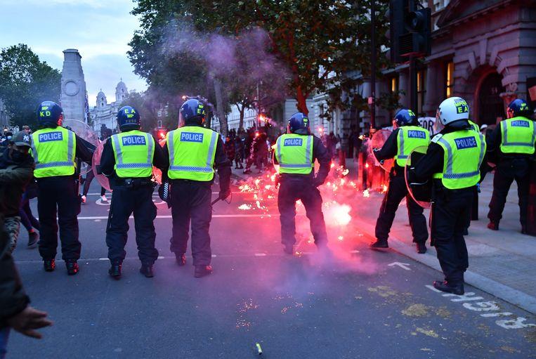 Protesters and police clash in London.