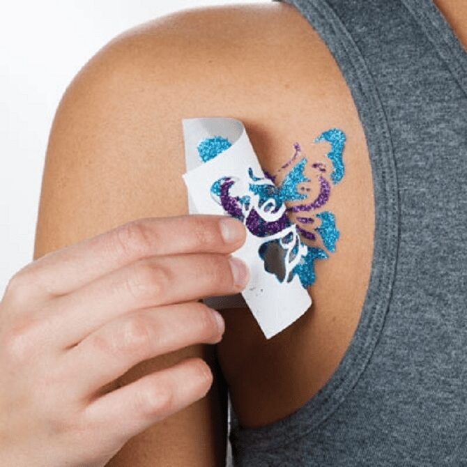 Tired of bad summer weather? Entertain your kids with a fake tattoo