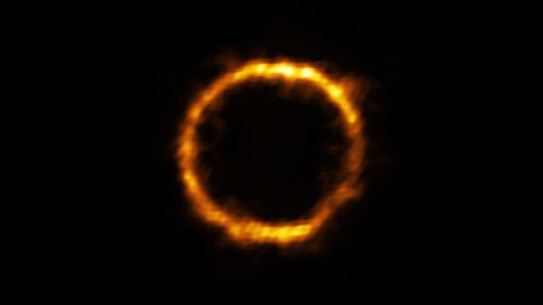 ESO took advantage of a nearby galaxy that acts as a powerful magnifying glass to observe SPT0418-47, also known as the Gravity Lens Effect. SPT0418-47 appears as a nearly perfect ring of light around the lens galaxy, because the two galaxies are almost exactly aligned.