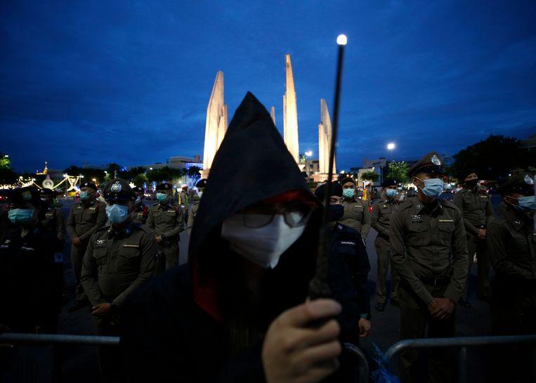 Securities stand guard during protests by Thai protesters