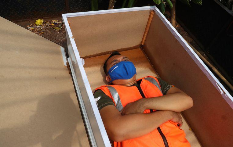 Man avoids Covid-19 fine by sleeping in a coffin for a minute