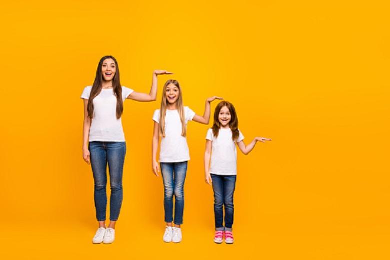 Why the height of adolescents vary according to their nationality?