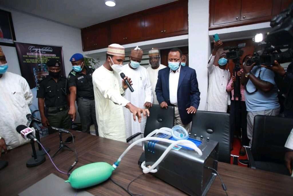 Usman with the Minister of State for Science and Technology Mohammed Abdullahi