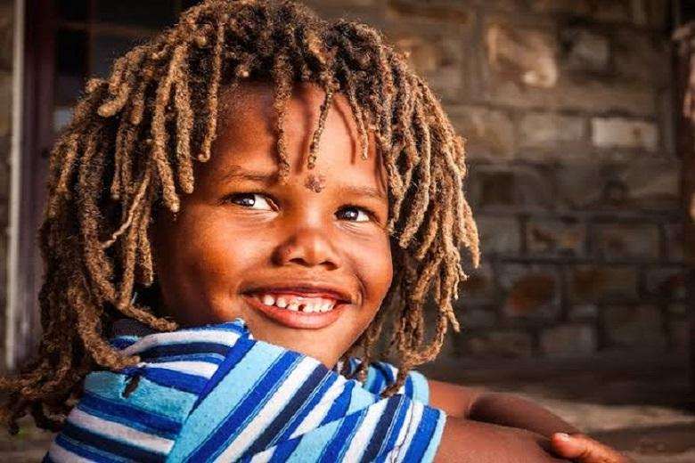 A nigerian child with Dada