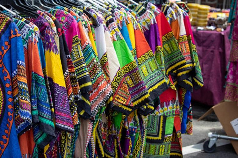 A rack of colorful dashikis