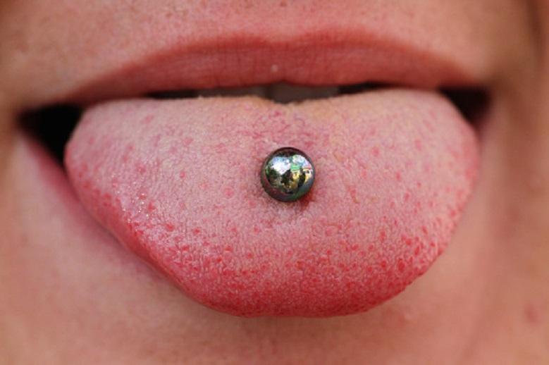 Types, pain, healing: why do women get tongue piercing