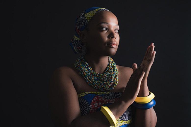 South african xhosa woman wearing colorful necklace and bracelets.