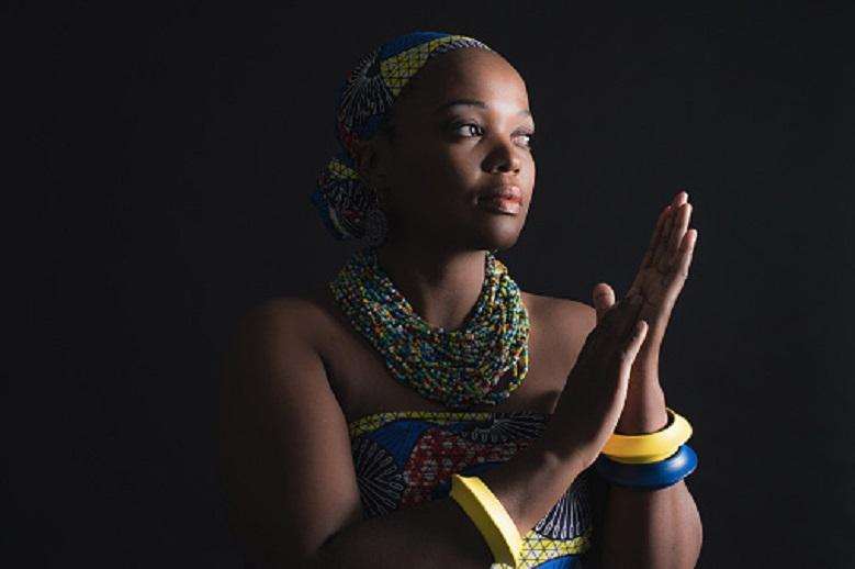 South african xhosa woman wearing colorful necklace and bracelets.
