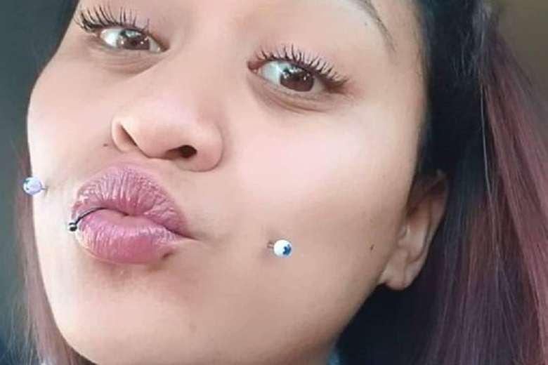 Cheek piercing