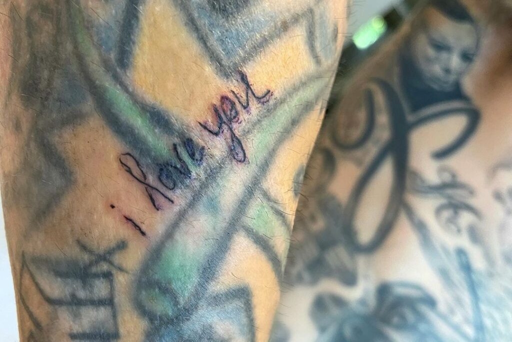 ‘I Love You’ tattooed on the inside  of the arm of the Blink 182 drummer