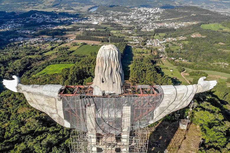 The Christ the Protector statue under construction in Encantado