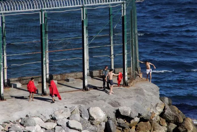 More than eighty migrants have reached the Spanish port city of Ceuta from Morocco by swimming. The migrants were arrested when they entered Spanish territory