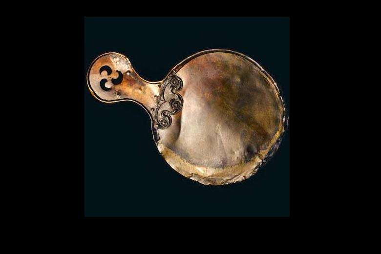What were the first mirrors, and how did they change over time?