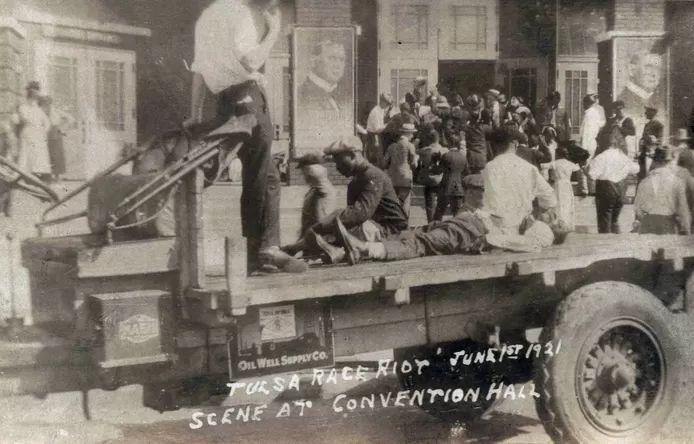 June 1, 1921: A white man guards imprisoned black residents of Tulsa