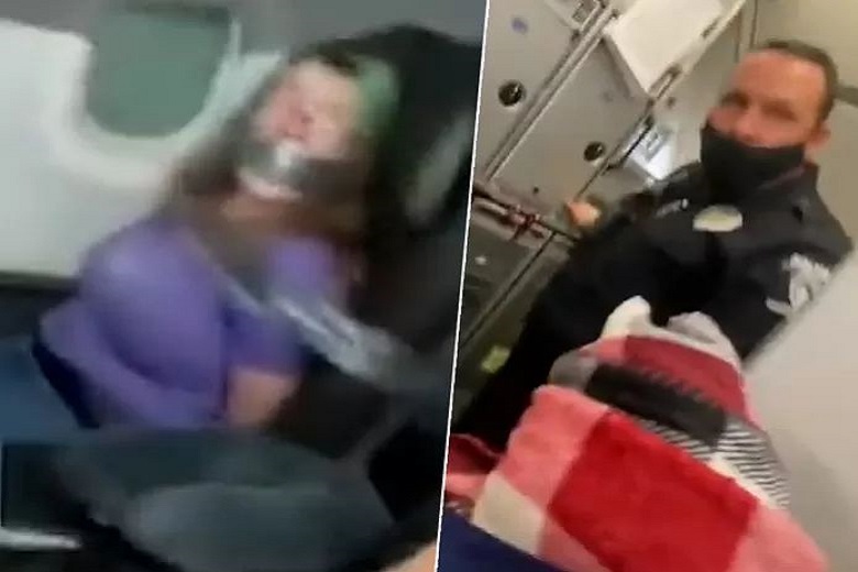 Woman duct-taped on flight try to open a door during flight