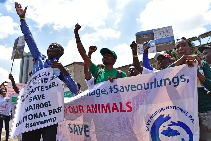 Environmental activists protest in Nairobi, Kenya, March 1, 2018, against a government decision to construct a standard-gauge railway line across the Nairobi National Park.