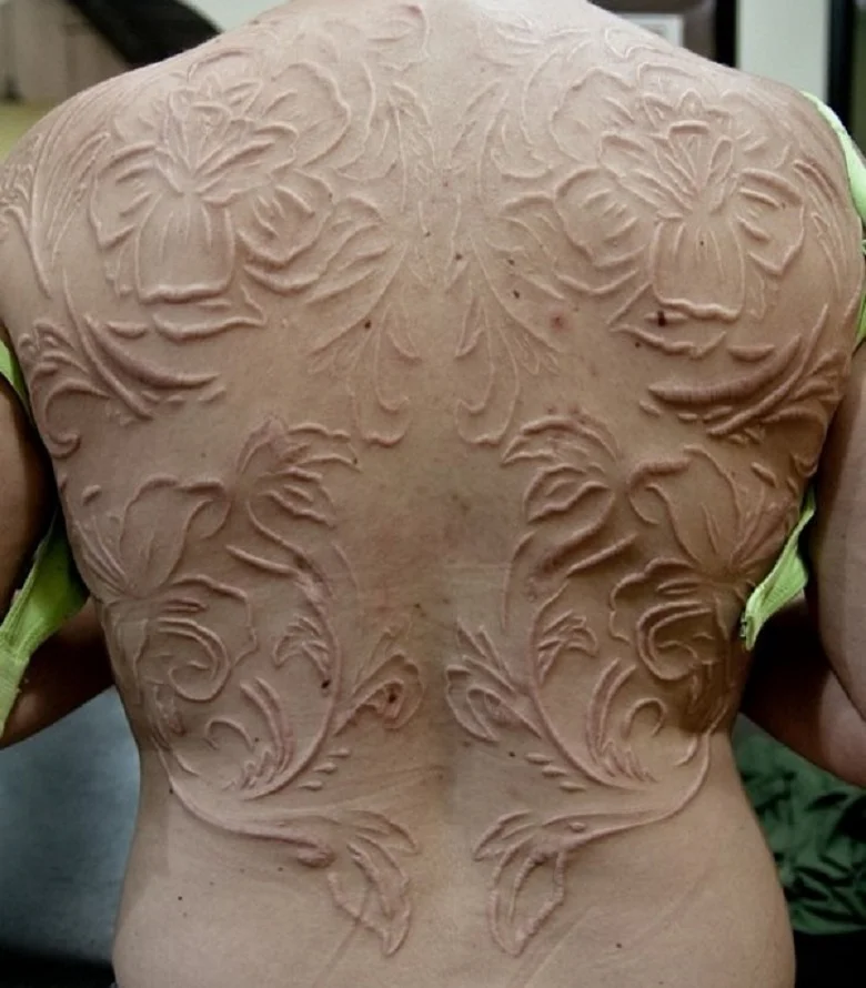 What are body modifications other than piercings and tattoos?