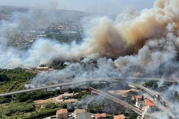 Italy has to deal with extremes: The north has again been hit by heavy thunderstorms, and scrub fires are still raging in the south.