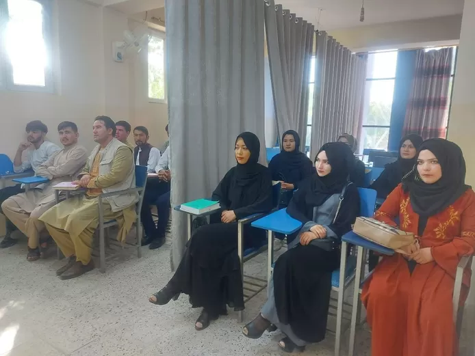 Afghan universities reopen: Photos show curtain separating male and female students