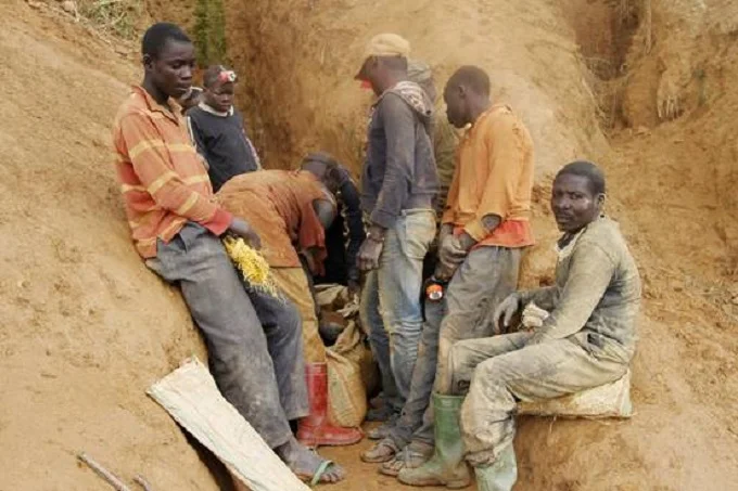 Local miners at gold-mine tunnel in the Democratic Republic of Congo, in a 2014 photo