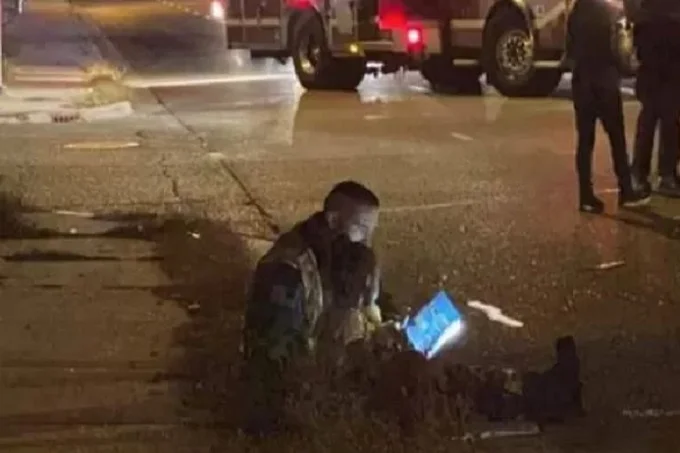 Touching photo of US firefighter reading a book to a rescued girl goes viral
