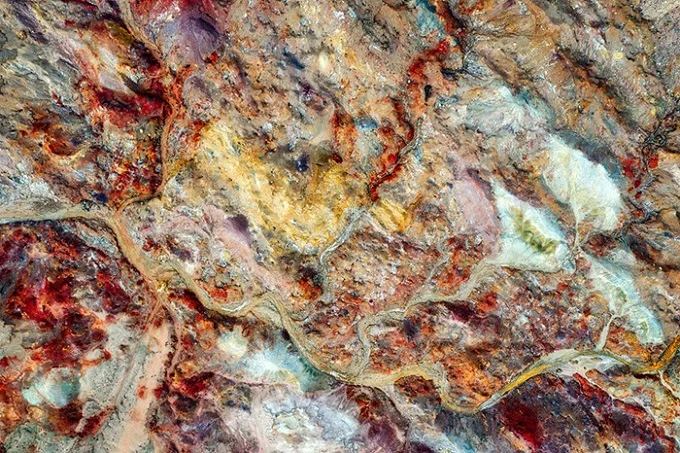 There are several colorful rocks and sands