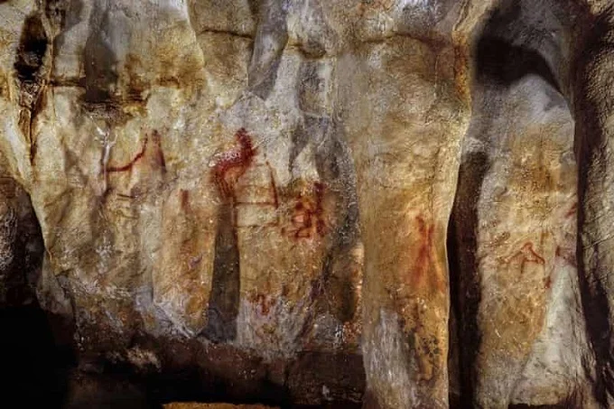 Paintings on a section of the La Pasiega cave wall