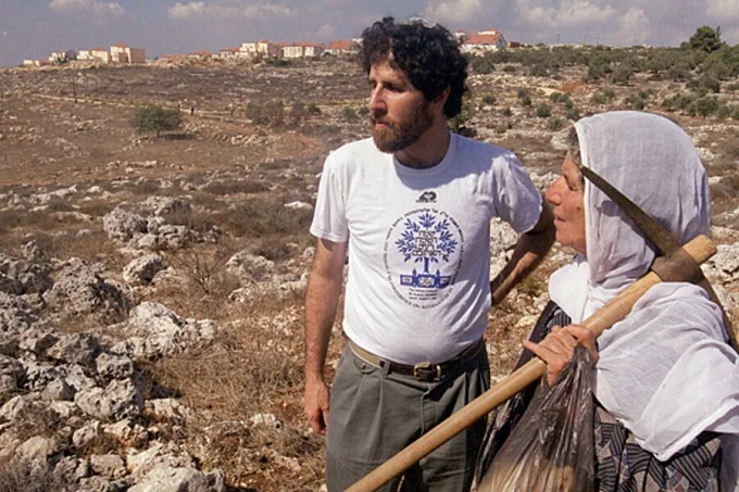 Arik Ascherman and Palestinian farmer